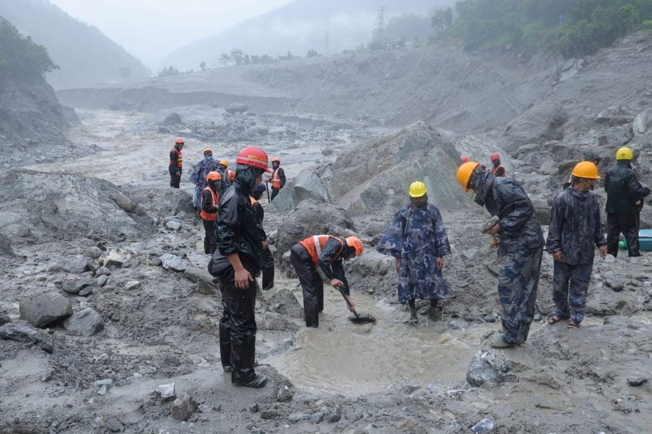 An undated handout photo shows rescue workers taking part in a rescue operation near the tunnel of the Trishuli 3A Hydropower Project, following deadly flash floods and mudslides in Rasuwa, Nepal.