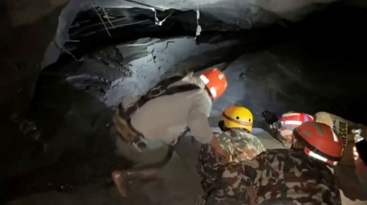 Rescue personnel search for victims inside the Rasuwagadhi Hydropower Project tunnel on Monday.