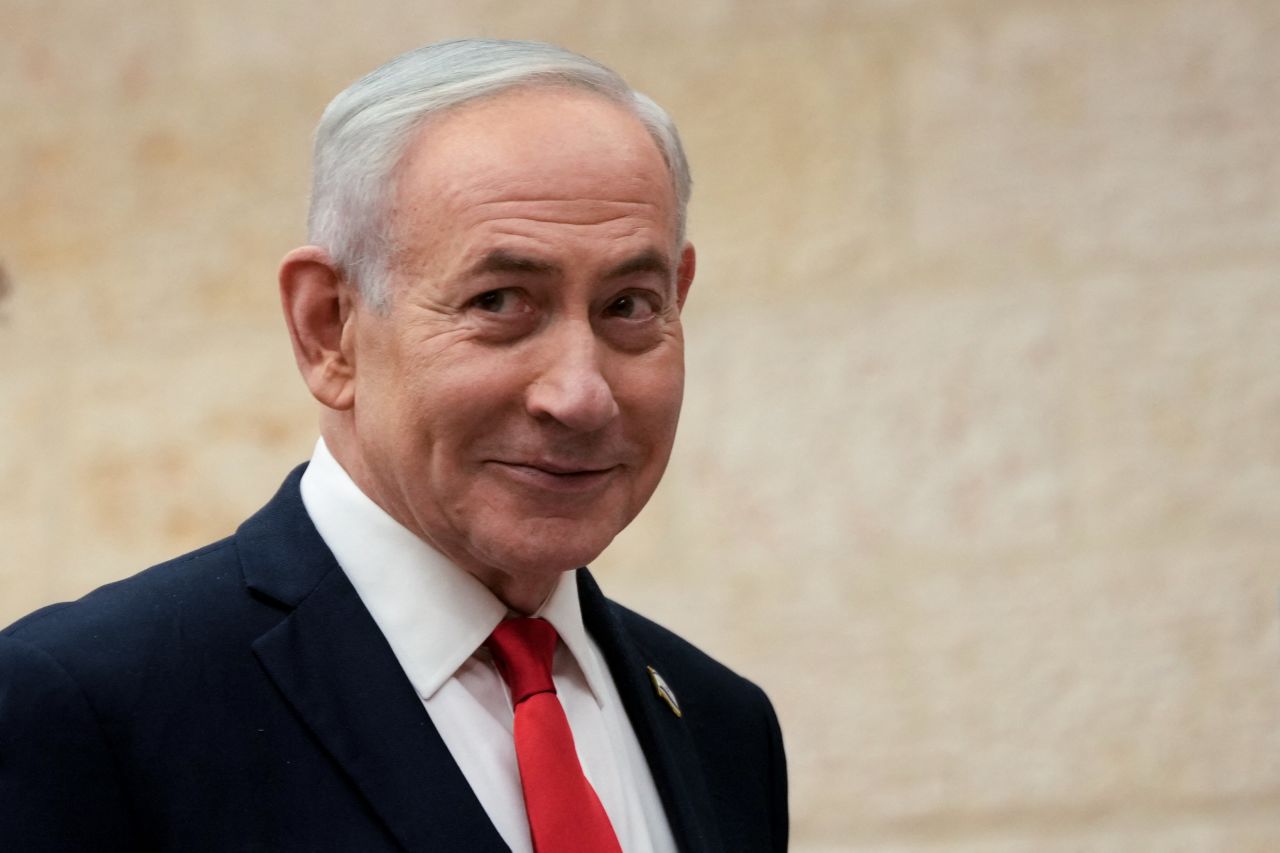 Israeli Prime Minister Benjamin Netanyahu arrives to cast his ballot in Jerusalem on August 17.
