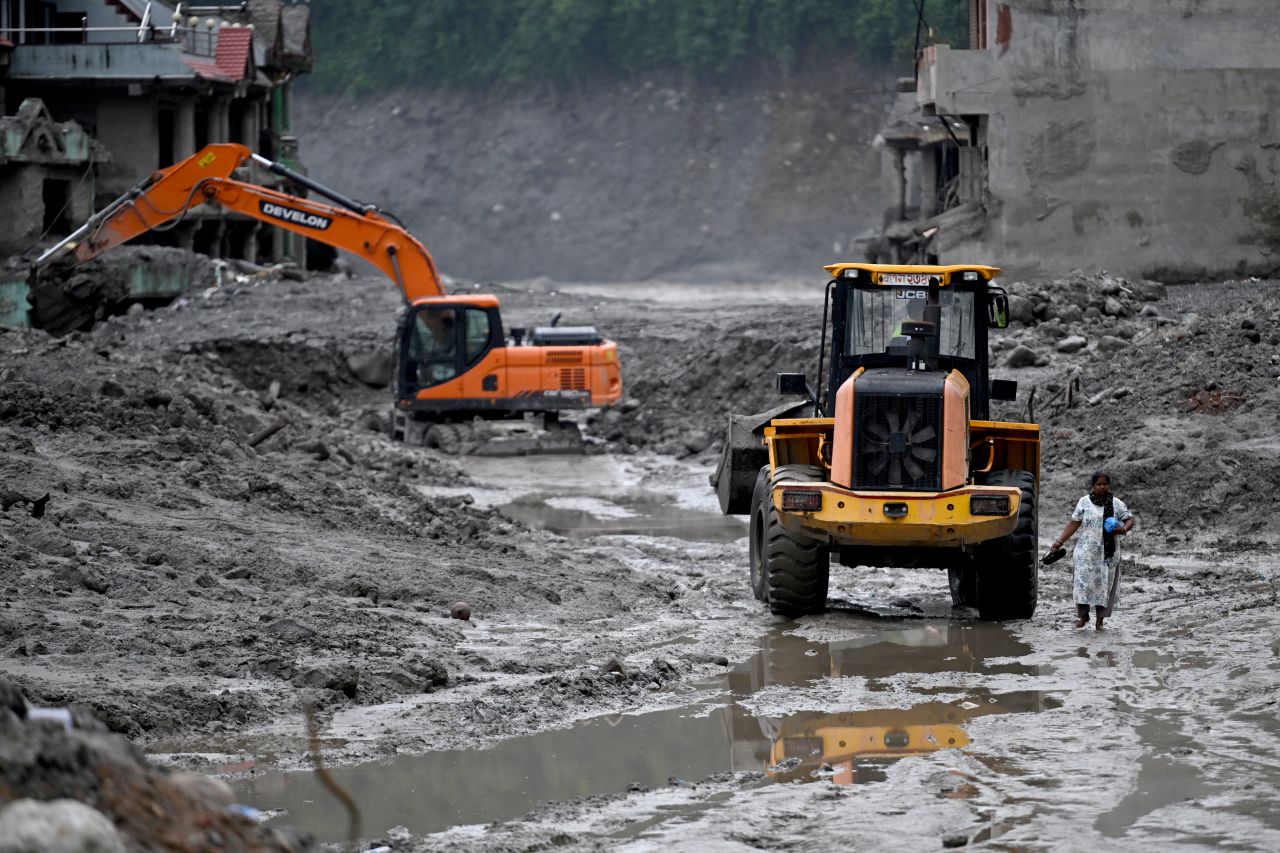 Rescue work continue in the aftermath of flash floods at Trishuli Center in Nepal's Nuwakot district on Monday.