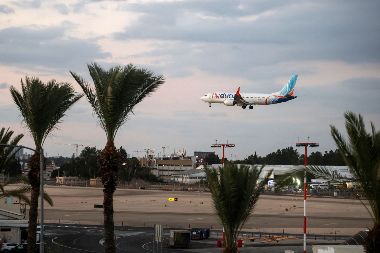 A plane, carrying passengers who were on the FlyDubai aircraft bound for Israel from the United Arab Emirates, which was diverted to Saudi Arabia following an emergency, arrives at the Ben Gurion Airport near Tel Aviv, Israel on Wednesday.
