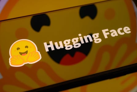 The Hugging Face logo displayed on a smartphone screen