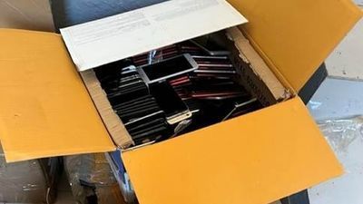 Boxes of phones from Chinese run compounds in Madagascar, reviewed by the Strike Force (DOJ).jpg